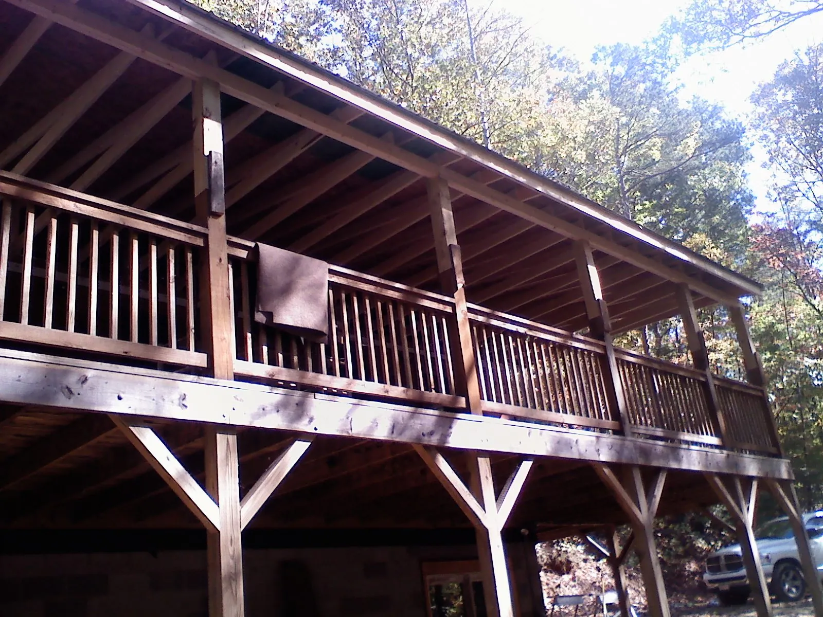 Timber framing under a new elevated porch and deck — Roof Leak Repair in Palm Beach by Roofing Brothers